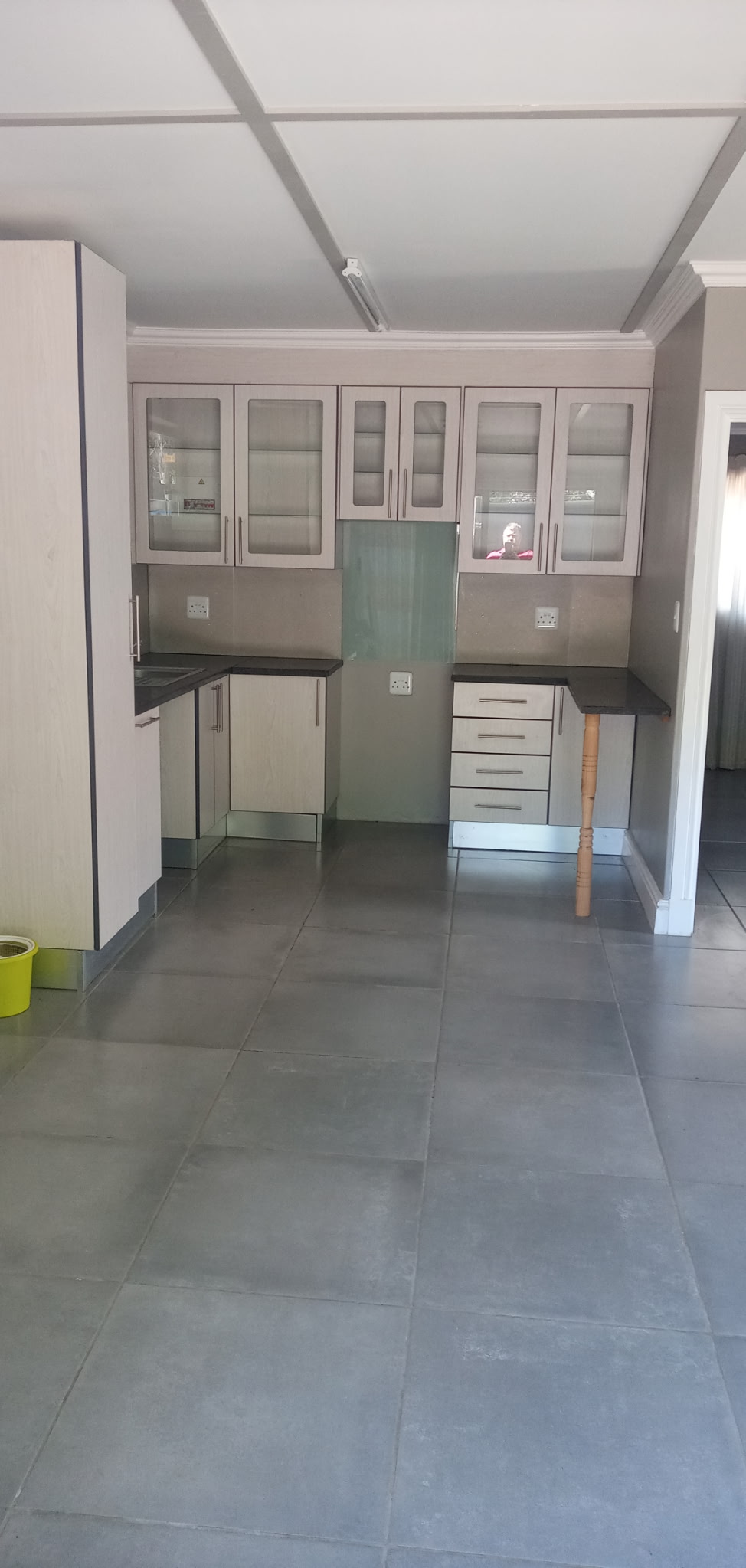 Cottage kitchen renovation with black cherry cabinets and granite worktop, full view